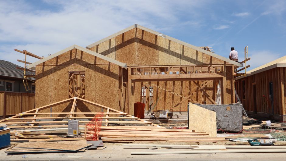 Professional contractor working on home exterior